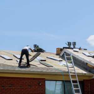 roofing professionals installing shingles